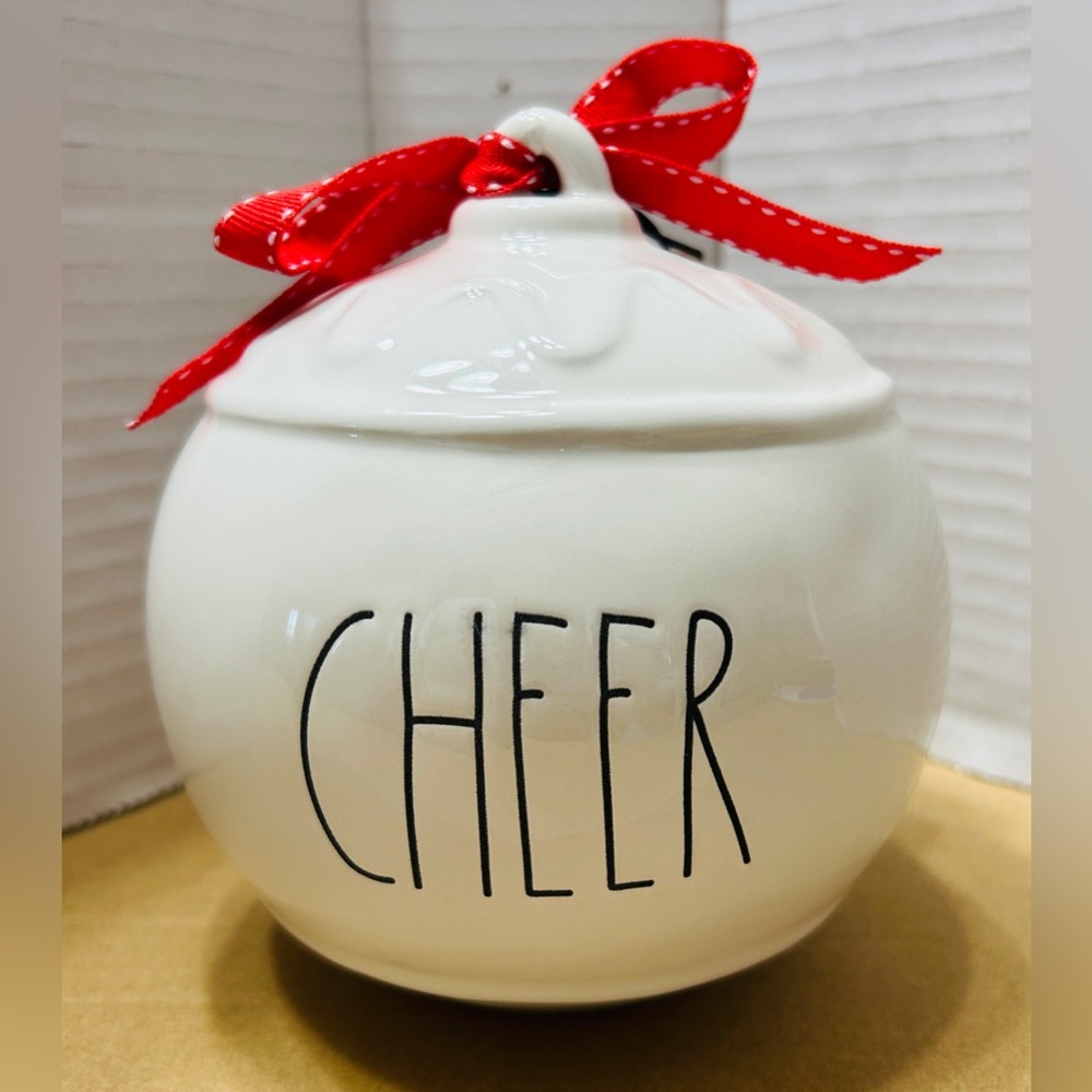 Rae Dunn ornament for Christmas. White with black CHEER letters. Red ribbon. NEW